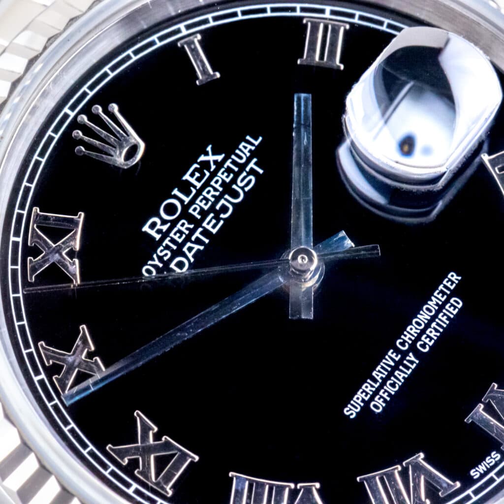 Alternative view of Rolex Oyster Perpetual Datejust Black Roman 16234 1997 (Volledige Set)